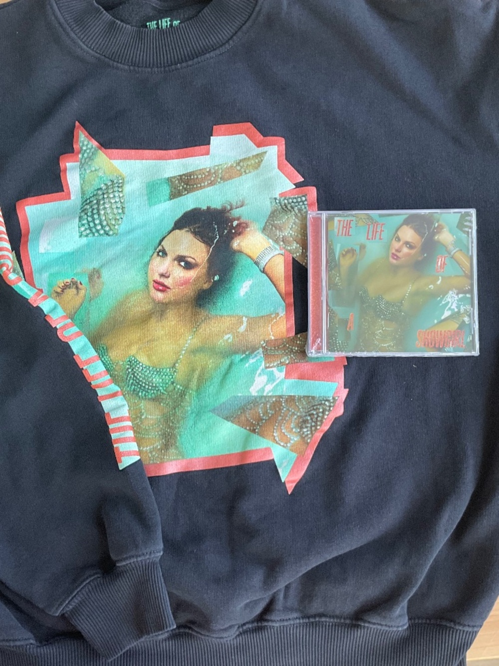 Official life of a showgirl crewneck sweatshirt with CD ( box not included )